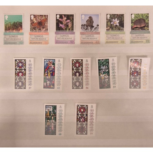 226 - Tray of seven stamp albums containing Guernsey stamps.