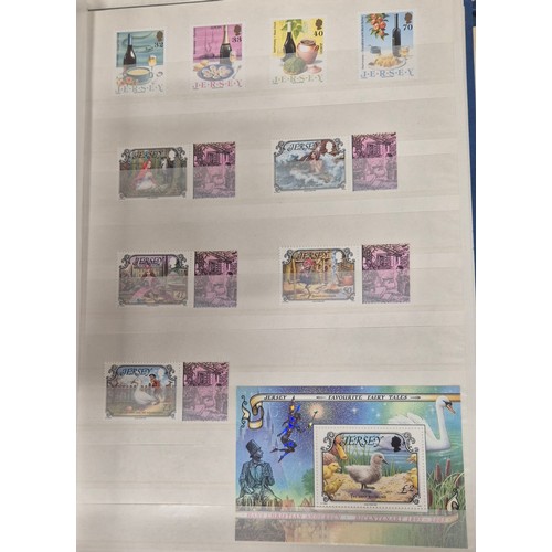 227 - Tray of seven stamp albums containing Jersey stamps.