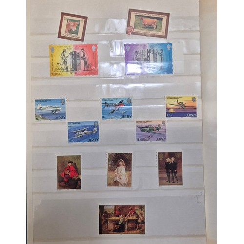227 - Tray of seven stamp albums containing Jersey stamps.