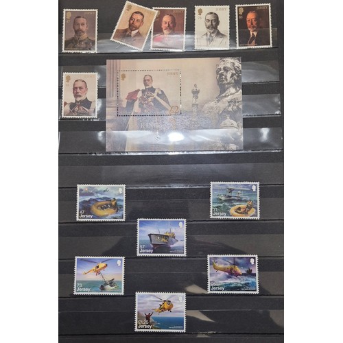 227 - Tray of seven stamp albums containing Jersey stamps.