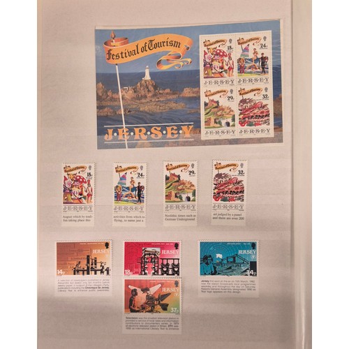 227 - Tray of seven stamp albums containing Jersey stamps.