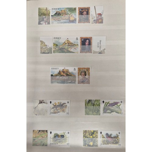 227 - Tray of seven stamp albums containing Jersey stamps.