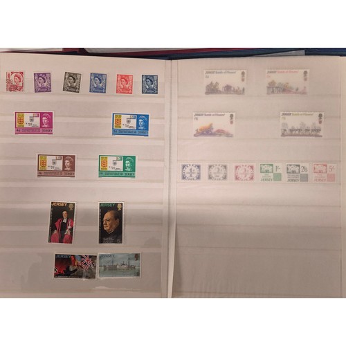 227 - Tray of seven stamp albums containing Jersey stamps.