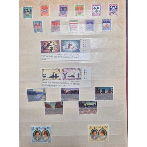 227 - Tray of seven stamp albums containing Jersey stamps.