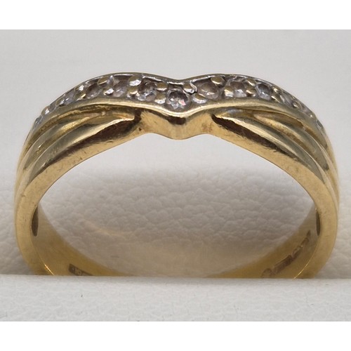 28 - 18ct yellow gold and diamond stone wish bone ring. 3.11Grams. Ring size L.