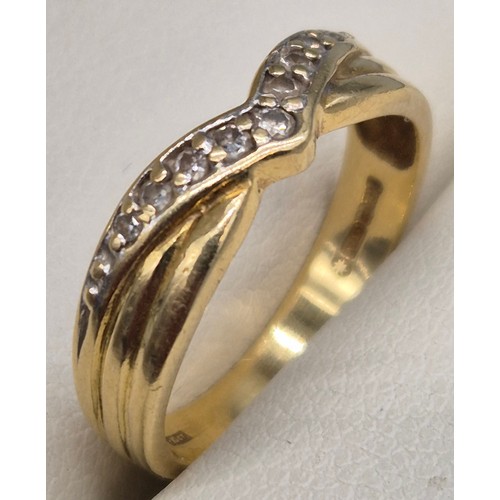 28 - 18ct yellow gold and diamond stone wish bone ring. 3.11Grams. Ring size L.