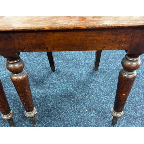 354 - John Taylor of Edinburgh
Two Victorian hall chairs with shield back and raised on turned legs. 91cm ... 