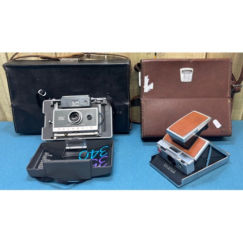 370 - Two polaroid camera's; Polaroid SX-70 Camera, accessories and travel bag and one other.