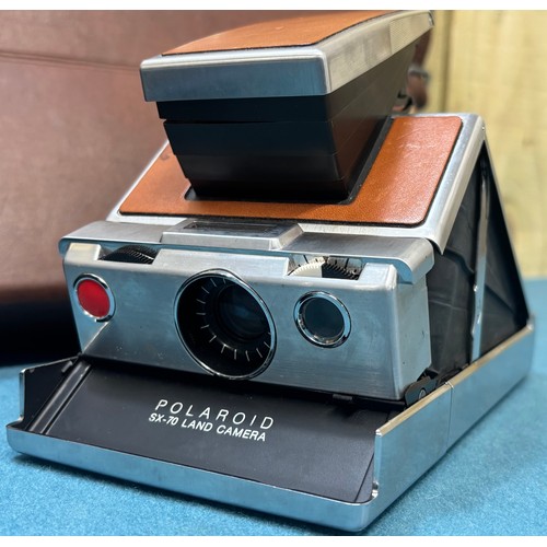370 - Two polaroid camera's; Polaroid SX-70 Camera, accessories and travel bag and one other.