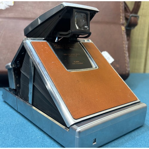 370 - Two polaroid camera's; Polaroid SX-70 Camera, accessories and travel bag and one other.