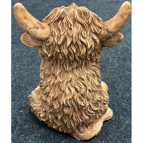 359 - Garden sculpture of highland cow. 30cm in height. Damage to horn.