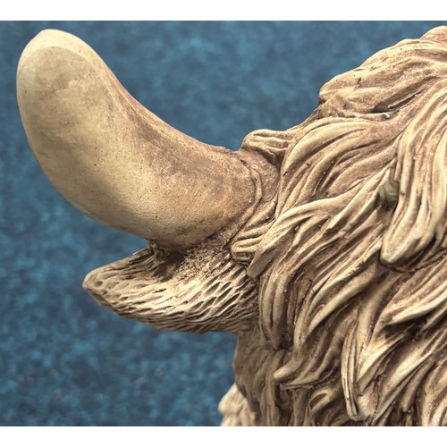 359 - Garden sculpture of highland cow. 30cm in height. Damage to horn.