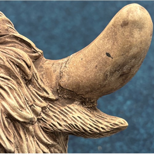 359 - Garden sculpture of highland cow. 30cm in height. Damage to horn.