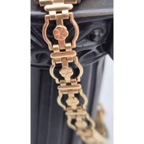 60 - 9ct yellow gold art deco design watch. Fitted with a rolled gold bracelet strap. Non runner.