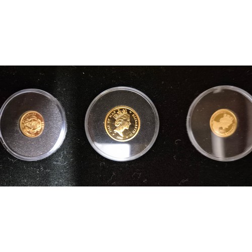 38 - Pobjoy Mint Cased collection of The smallest gold coins in the World. Limited edition 51/3000. Twent... 