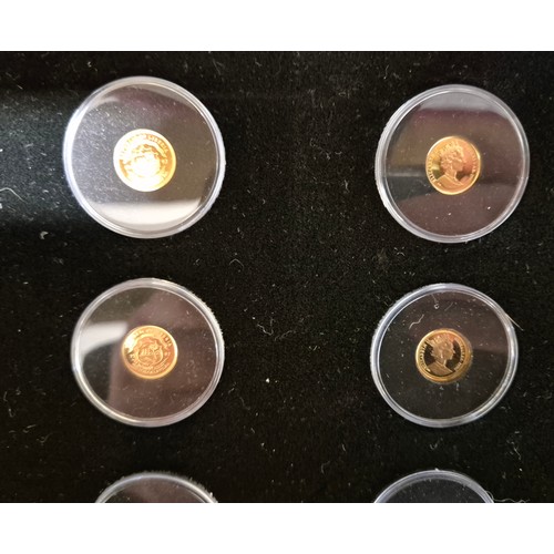 38 - Pobjoy Mint Cased collection of The smallest gold coins in the World. Limited edition 51/3000. Twent... 