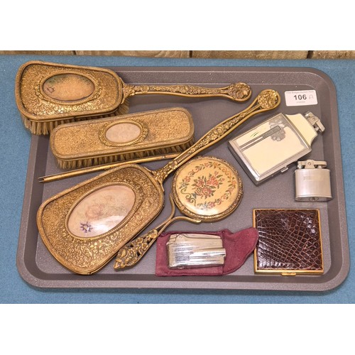 106A - A Tray of collectables; Vintage dressing table set, Ladies compact and three various Ronson Lighters... 