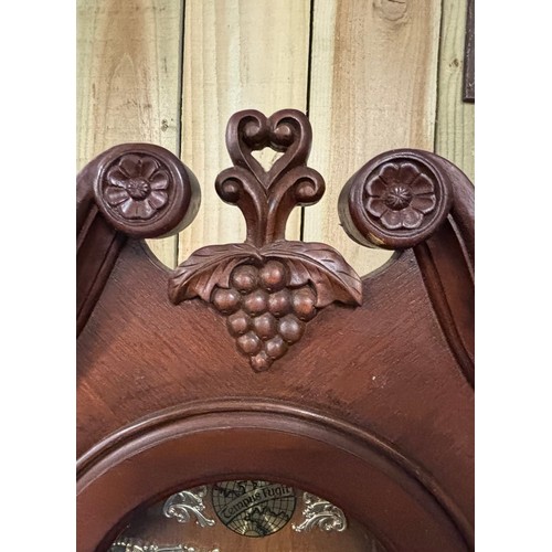 444 - German made Grandfather Clock. Hardwood darkwood case. Comes with weights and pendulum. 193cm high.