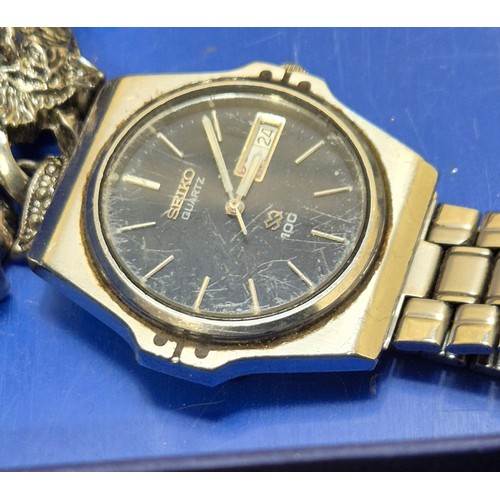 108A - Tray of costume jewellery and watches; Seiko quartz 100, Raymond Weil and Atlas watches.