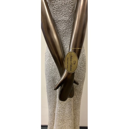 438 - The Juliana Collection, Large 4'8ft lady figurine. Heavy piece. Comes with original tag.