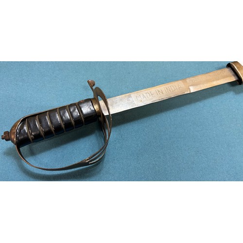 463 - Indian Sabre and scabbard. Together with two wall hanging shield and sword plaques.