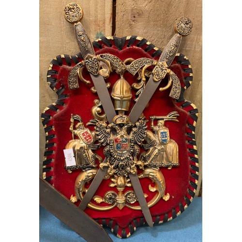 463 - Indian Sabre and scabbard. Together with two wall hanging shield and sword plaques.