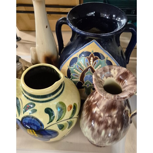 467 - Two trays of collectable odds; Indian tree vase, Figure on bench, cat sculpture and blue and white v... 