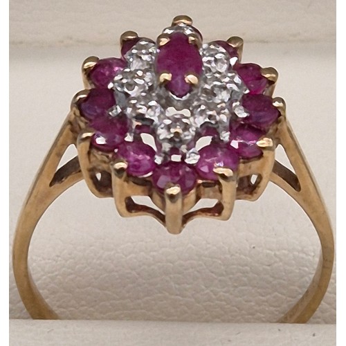 84 - 9ct yellow gold, ruby and diamond cluster ring. 2.40Grams. Ring size N 1/2.