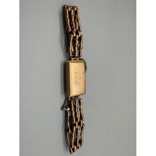 101A - 9ct yellow gold scrap watch case and strap. 11.54grams.