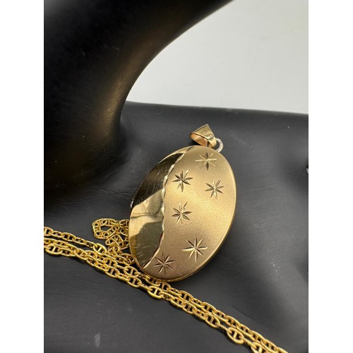 113A - 925 silver gilt locket together with a 9ct scrap gold chain. 1.33grams.