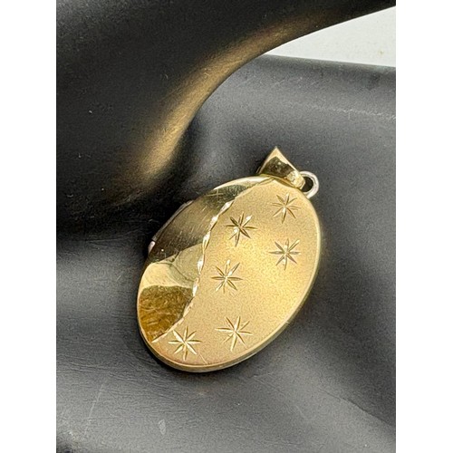 113A - 925 silver gilt locket together with a 9ct scrap gold chain. 1.33grams.