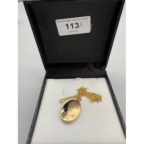 113A - 925 silver gilt locket together with a 9ct scrap gold chain. 1.33grams.