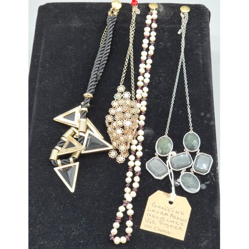 124A - A Collection of silver and costume jewellery; Tray of silver rings, costume necklaces and earrings.