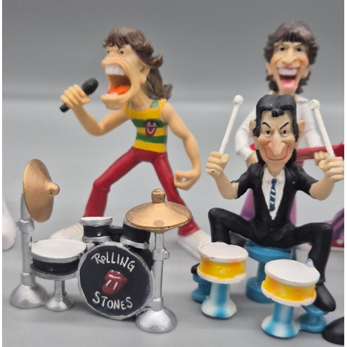 140 - Collection of Rolling stones & Kiss Band figures.