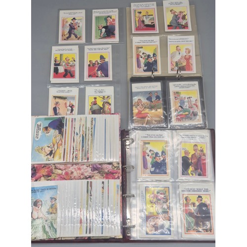 147 - Three albums of antique Comical Postcards.