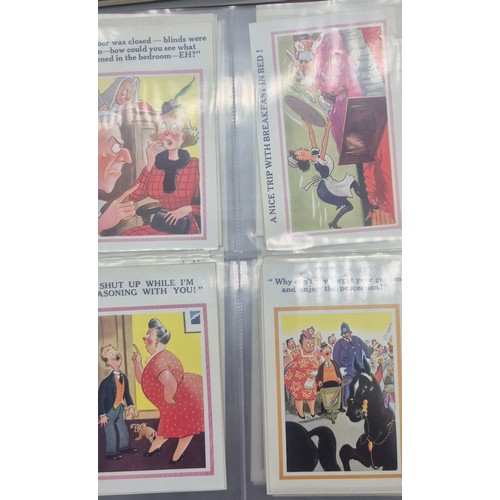 147 - Three albums of antique Comical Postcards.