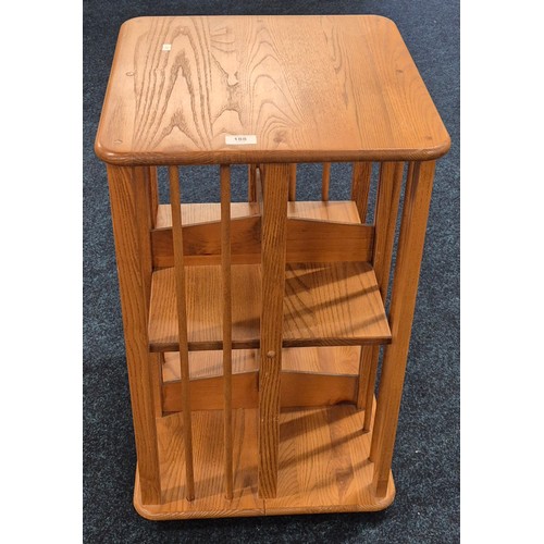 188 - Light Oak Ercol Style Revolving Book Case. H75.5xL45xW44.5