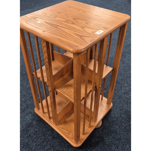 188 - Light Oak Ercol Style Revolving Book Case. H75.5xL45xW44.5