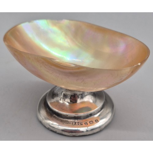 142A - A Selection of silver items; Birmingham silver and mother of pearl shell salt dish. Silver miniature... 