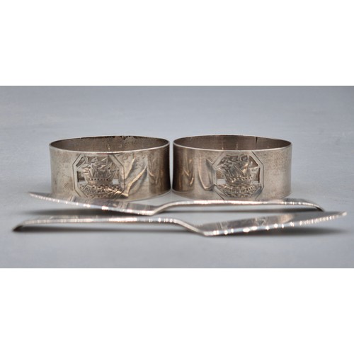 22 - Pair of Birmingham silver napkin rings engraved with galleons 