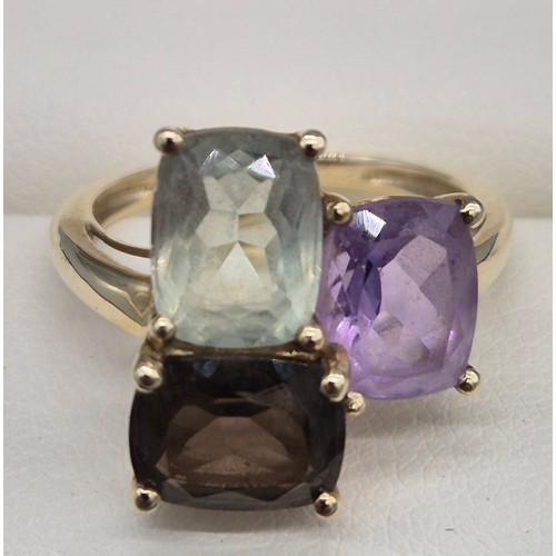 29 - 9ct yellow gold ladies ring fitted with three gem stones, Amethyst and quartz. 4.04Grams. Ring size ... 