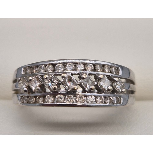 27 - 18ct white gold and diamond stone ring. 0.50cts diamonds. 4.70Grams. Ring size O.