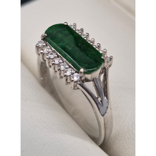 26 - 18ct white gold, Green Stone and diamond stone ring. 4.57grams. Ring size P 1/2.