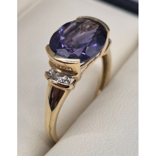 30 - 9ct yellow gold, Amethyst and diamond stone ring. 2.57Grams. Ring size P.