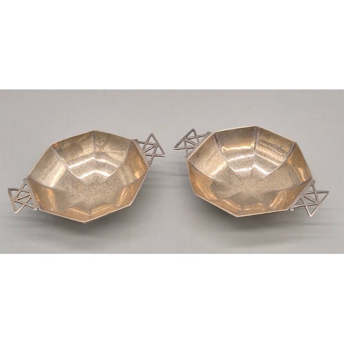 19 - A Collection of silver items; Pair of Sheffield silver art deco two handle condiment pots. Pair of S... 