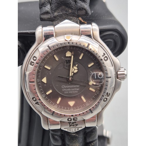 21 - Tag Heuer Chronometer wristwatch. No. 13274. WH5212. Working. Leather strap has wear.