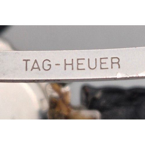 21 - Tag Heuer Chronometer wristwatch. No. 13274. WH5212. Working. Leather strap has wear.