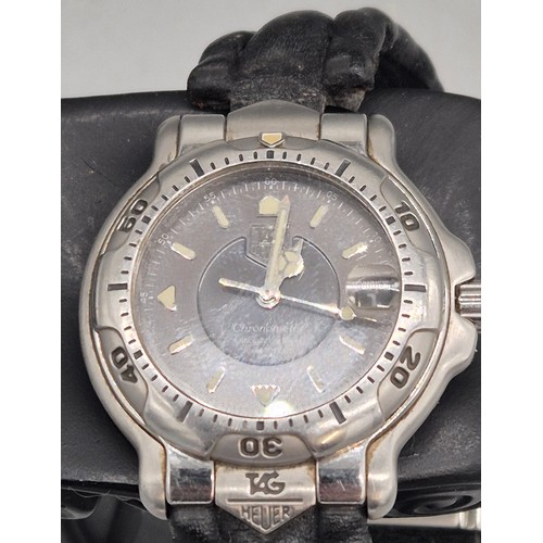 21 - Tag Heuer Chronometer wristwatch. No. 13274. WH5212. Working. Leather strap has wear.