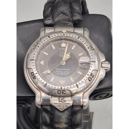 21 - Tag Heuer Chronometer wristwatch. No. 13274. WH5212. Working. Leather strap has wear.