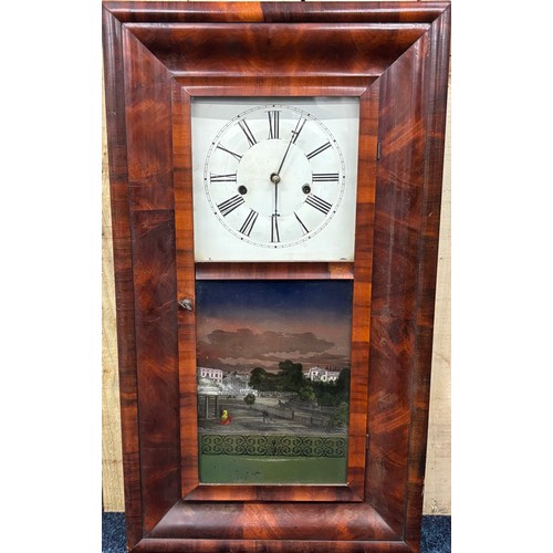 Antique American wall clock. Detailed with painted glass panel door ...
